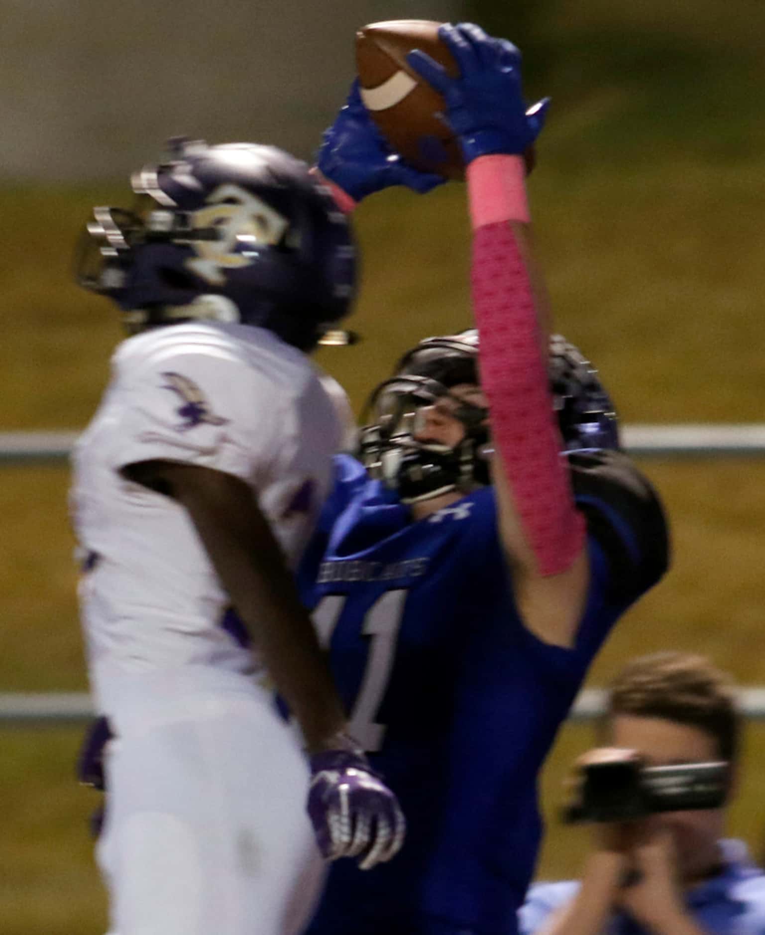 Trophy Club Byron Nelson receiver Tanner Arnold (11) leaps to pull down a pass for a...