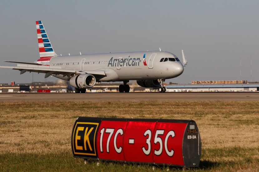 An American Airlines Airbus A321 lands on Runway 17-C at Dallas Fort Worth (DFW)...