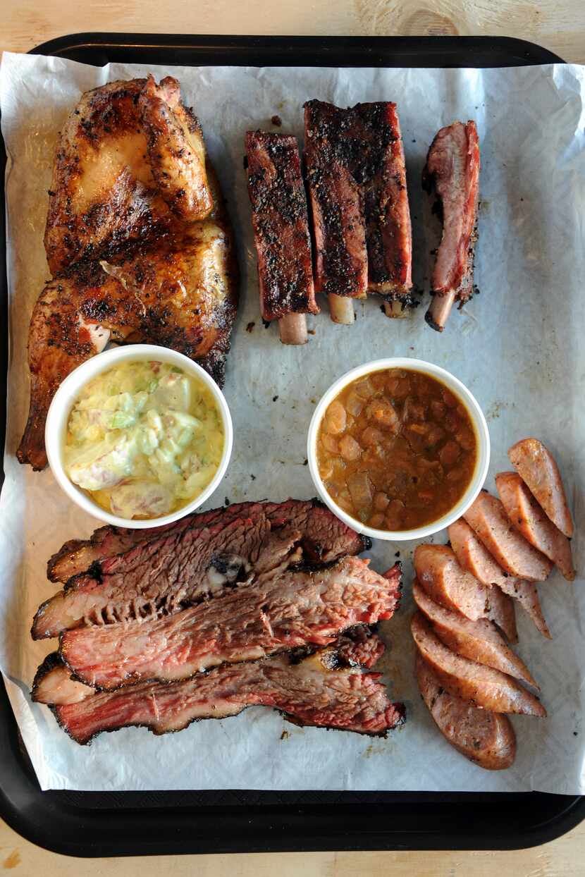 Guests can choose from brisket, chicken, ribs, sausage and turkey with sides like potato...