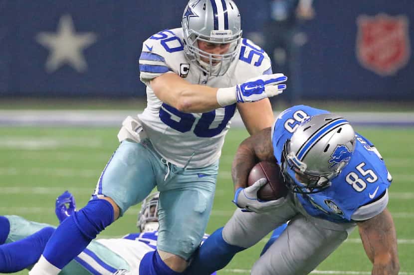 Dallas Cowboys outside linebacker Sean Lee (50) makes the stop on Detroit Lions tight end...