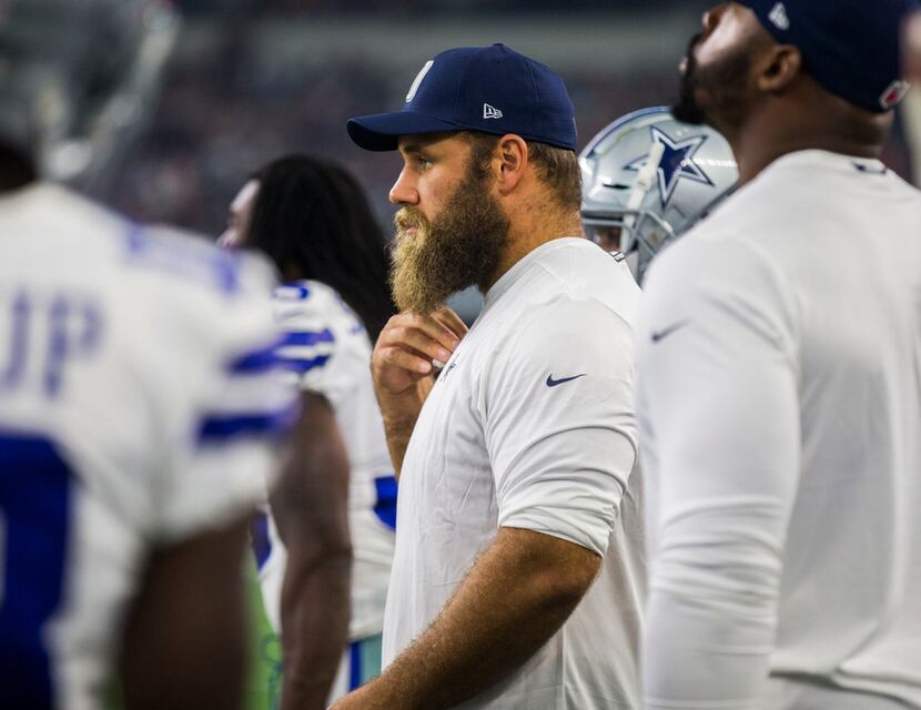 Dallas Cowboys center Travis Frederick (72) stands on the sideline during the first quarter...