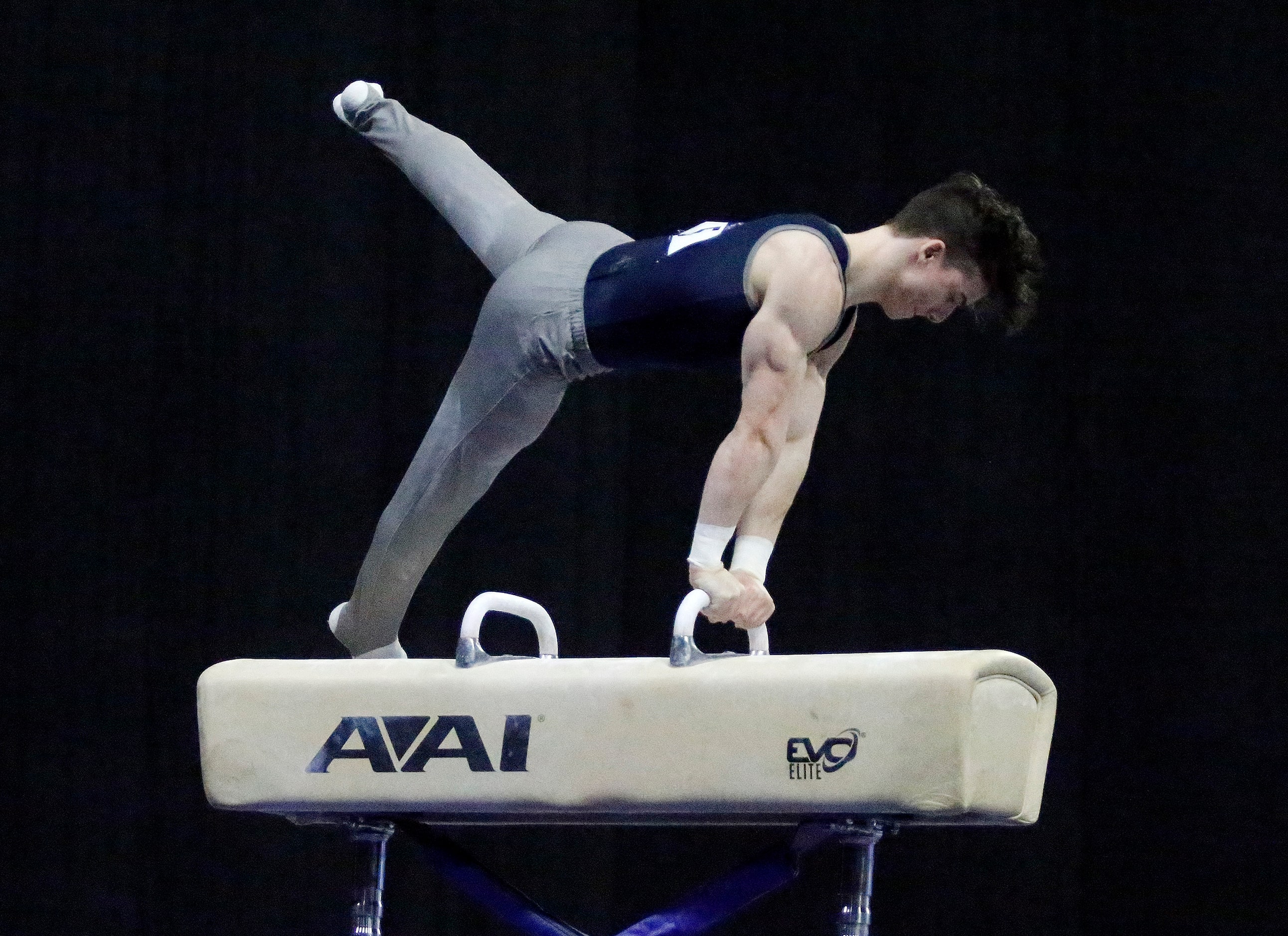 Matt Cormier of Penn State performs on the pummel horse during the mens finals at the USA...