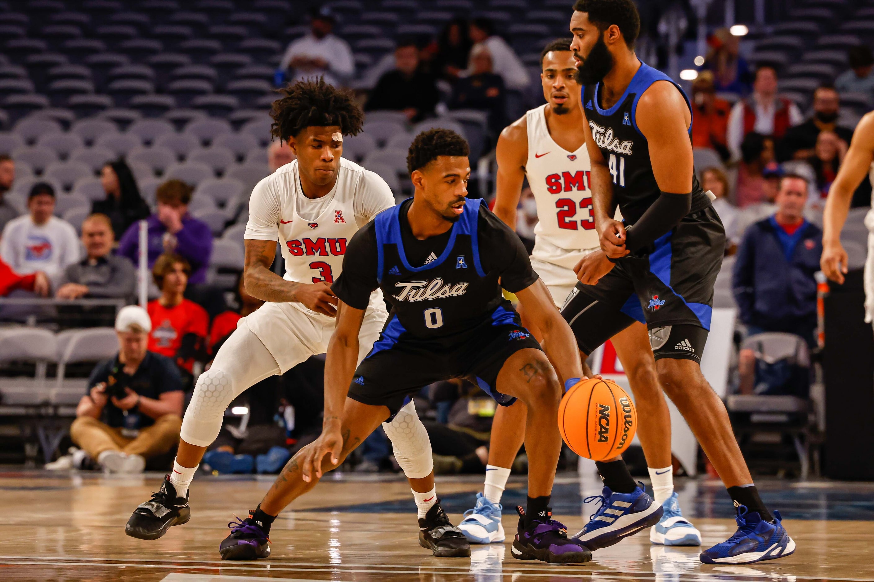 Tulsa Golden Hurricane guard Curtis Haywood II (0) tries to pass the ball as Southern...