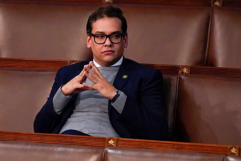 Rep. George Santos, R-N.Y., waits for the start of a session in the House chamber as the...