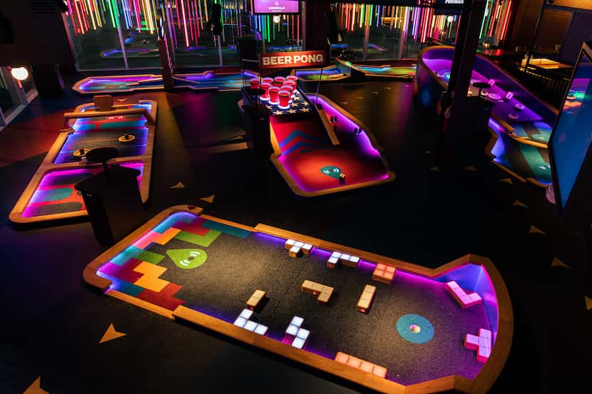 Puttshack's future Dallas venue will span two stories with creative mini golf holes visitors...