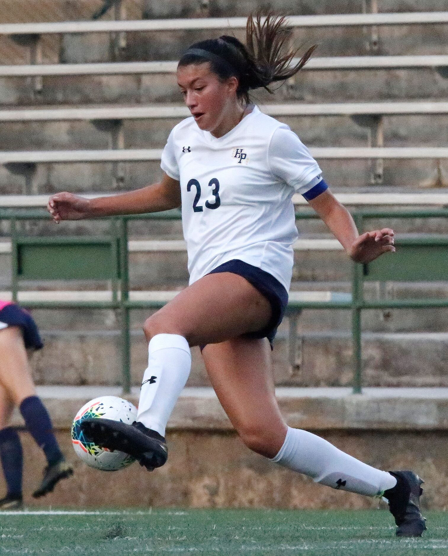 Highland Park forward Maja Davison (23) dribbles the ball during the first half as Wakeland...