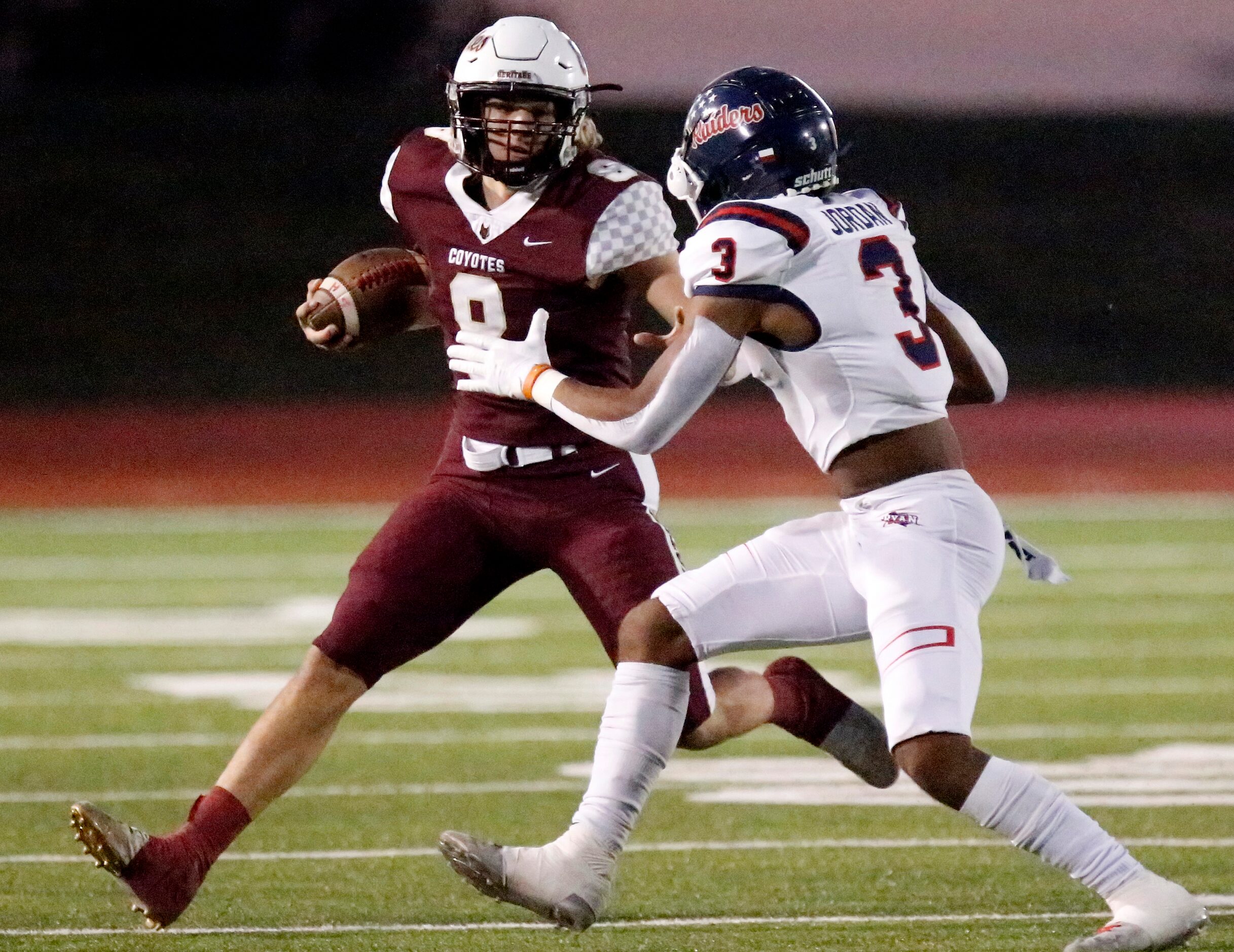 Frisco Heritage High School tight end Bryce Gilchrist (8) is met by Denton Ryan High School...