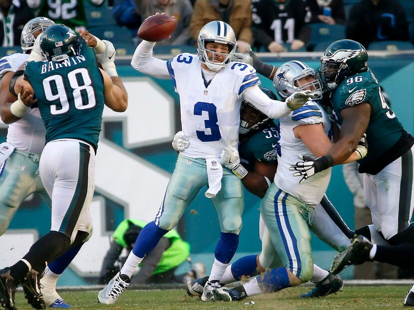 Dallas Cowboys quarterback Mark Sanchez (3) is sacked by Philadelphia Eagles defensive end...