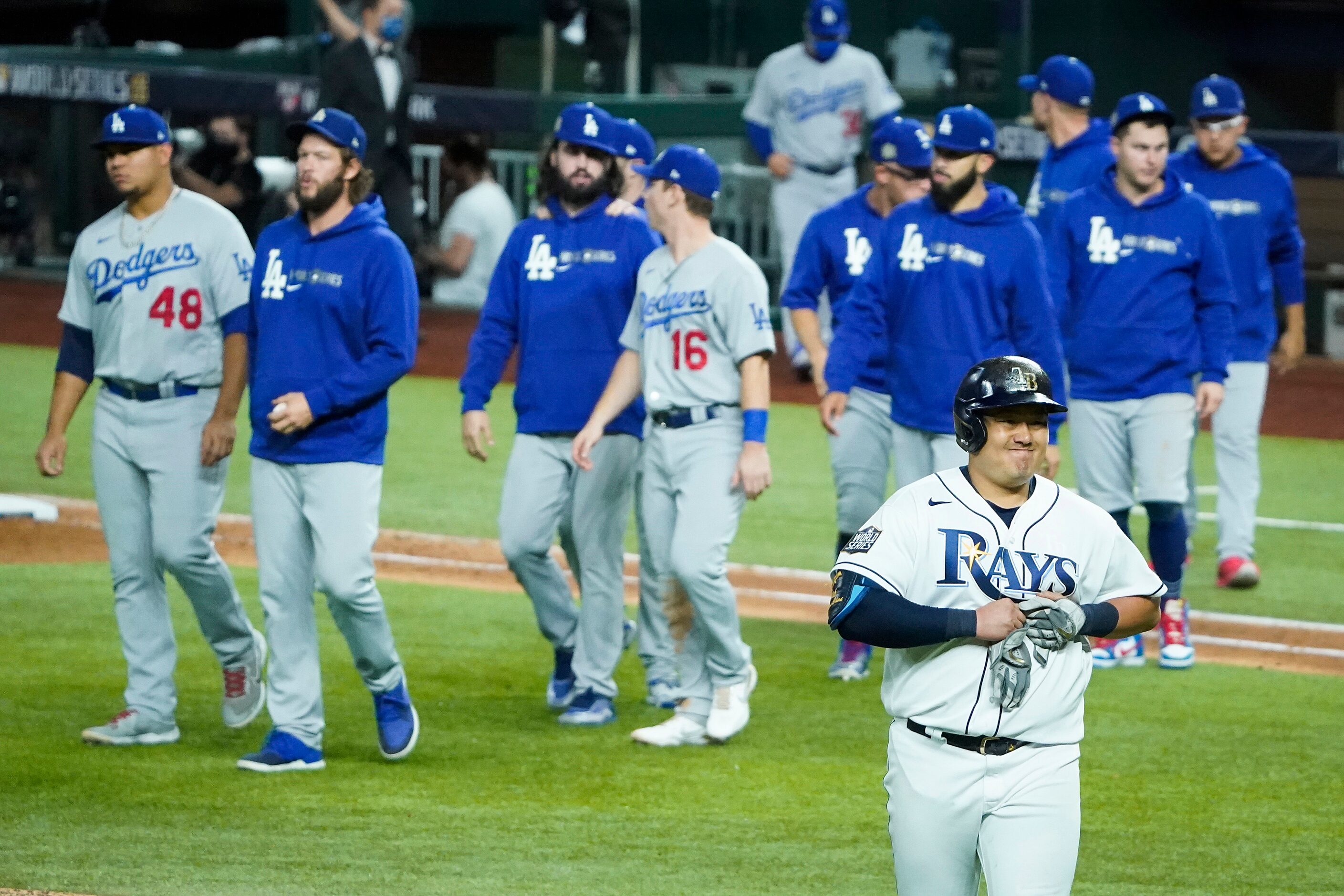 Tampa Bay Rays first baseman Ji-Man Choi walks off the field after lining out to left field...