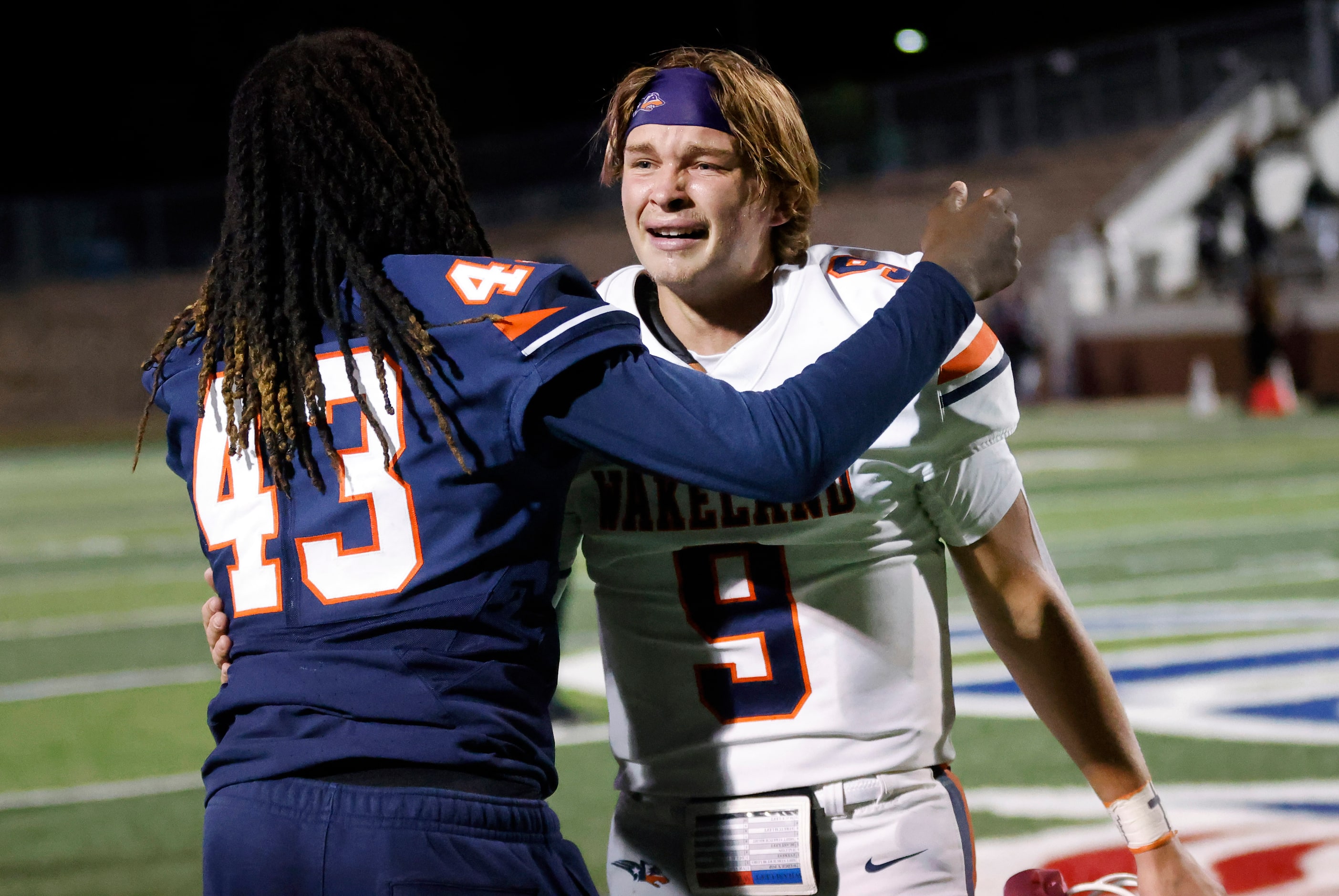 Frisco Wakeland quarterback Brennan Myer (9) is consoled by a teammate as he was overcome...