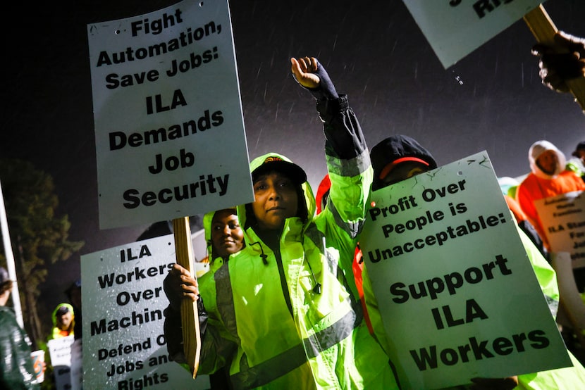 Dockworker Meikysha Wright and others strike outside the Virginia International Gateway in...