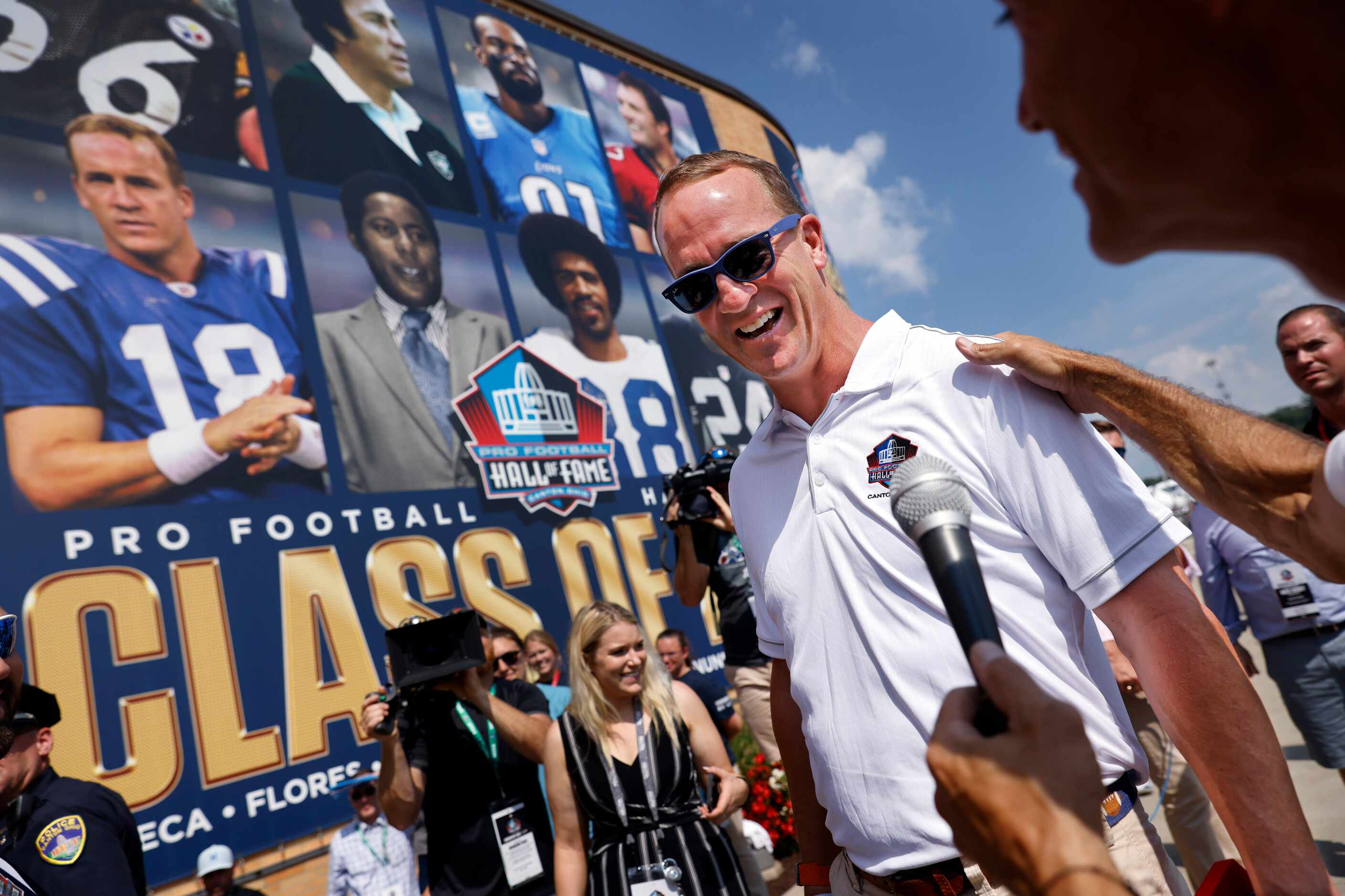 Pro Football Hall of Fame inductee Peyton Manning of the Indianapolis Colts visits with the...