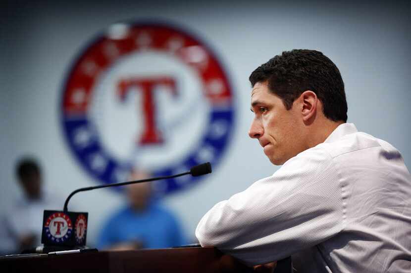 Texas Rangers President of Baseball Operations and General Manager Jon Daniels fields...