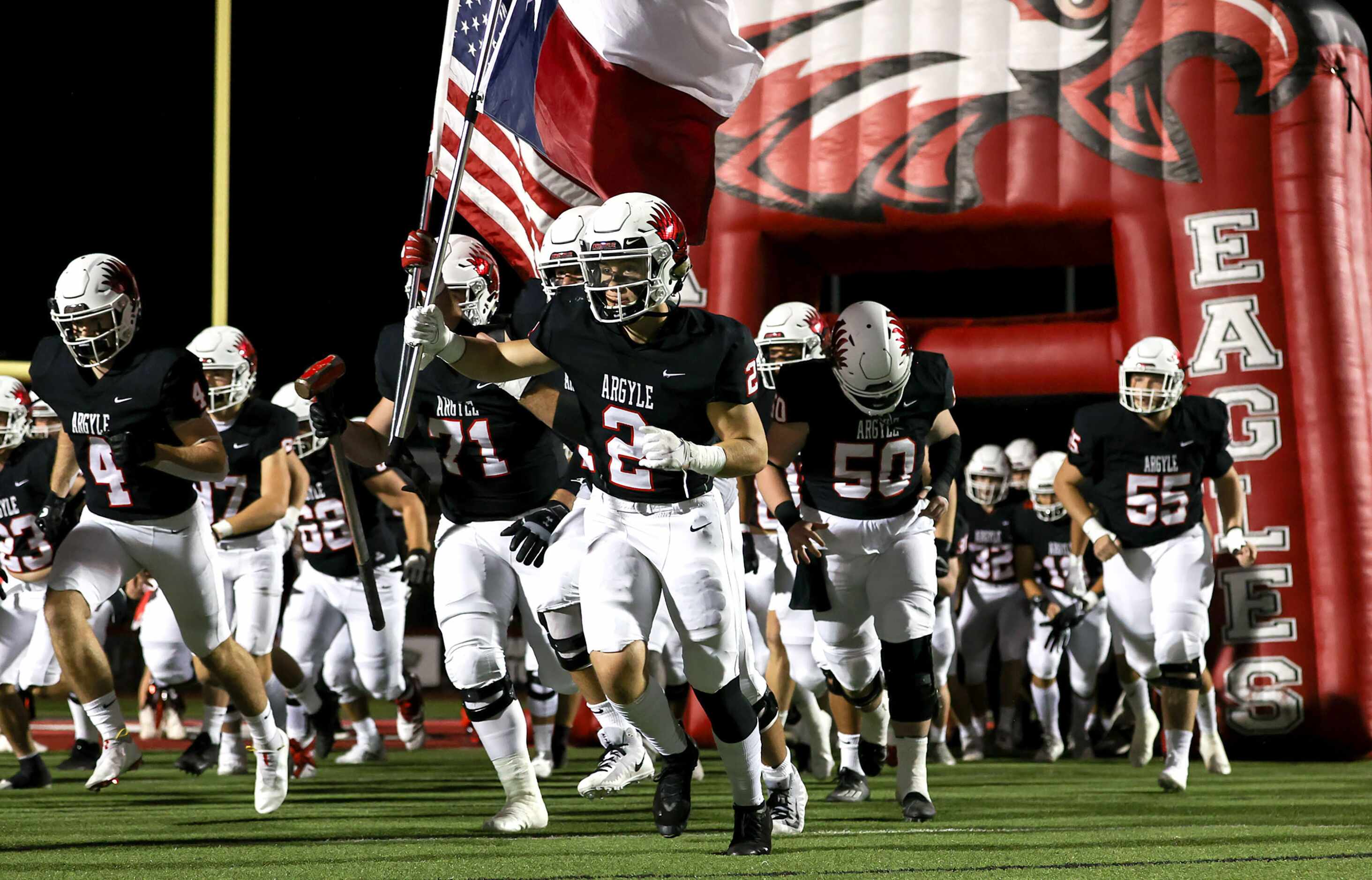 The Argyle Eagles enter the field to face Terrell in a District 7-4A high school football...