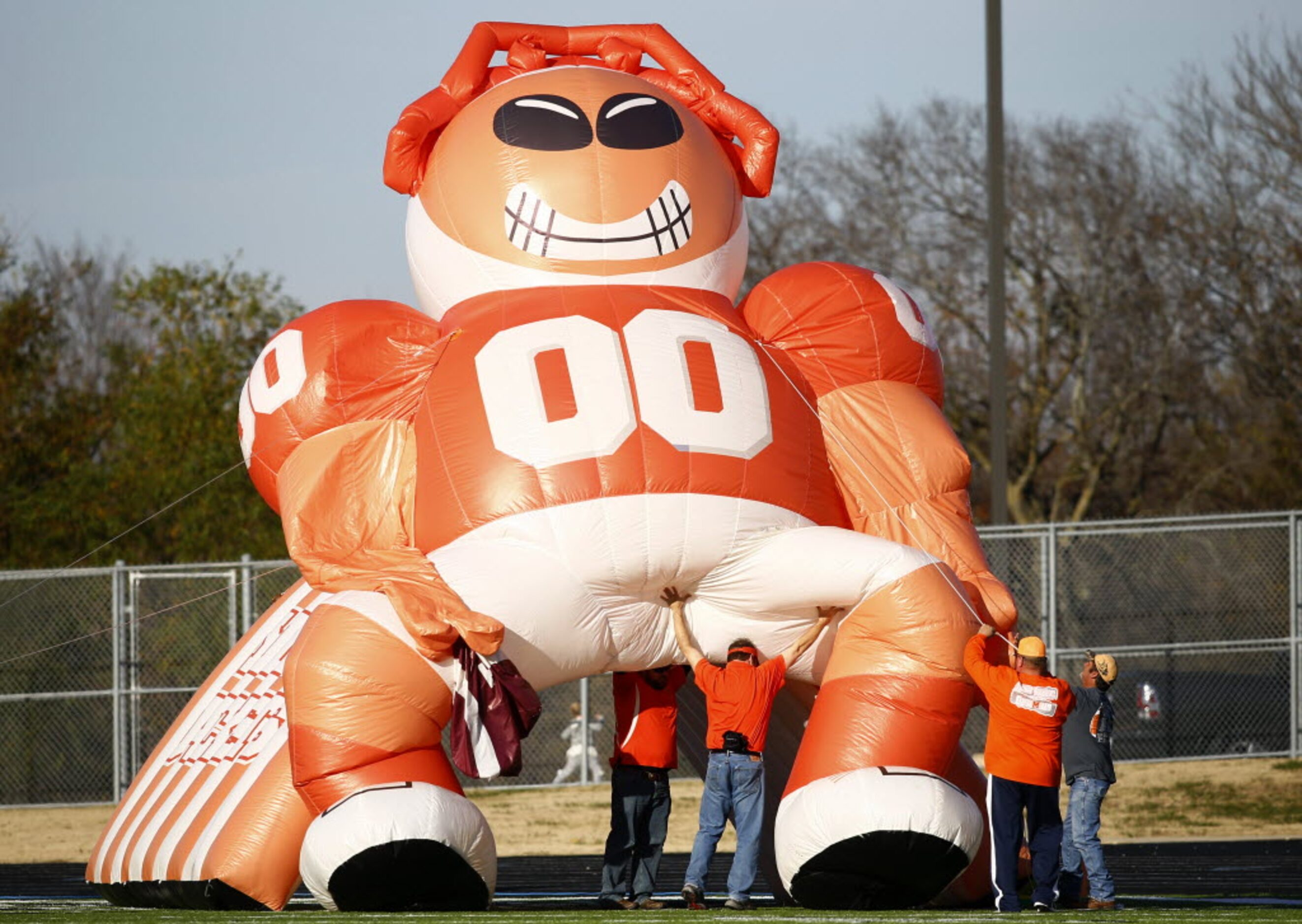 TXHSFB The Mineola booster club raises the inflatable for the second half against Sunnyvale...