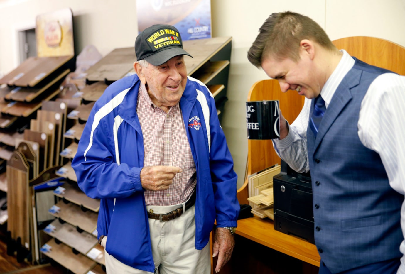 Chester Hollingsworth shares a laugh with co-worker Garrett Whitcomb at S&H Distributing in...