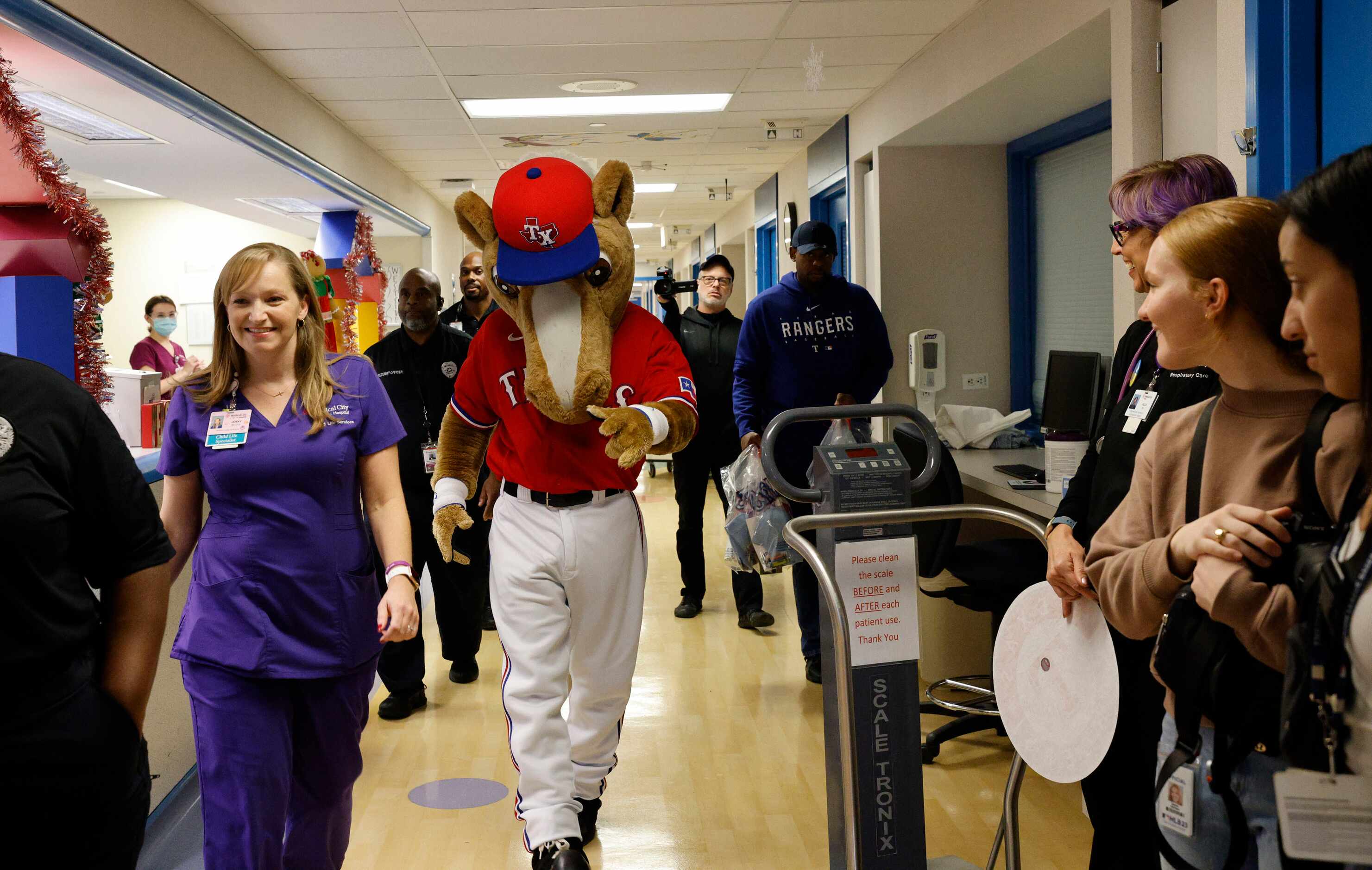 Rangers Captain, the mascot of the Texas Rangers, visits the patients, Wednesday, Dec. 13,...
