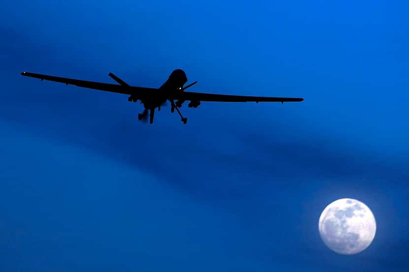 
An unmanned U.S. Predator drone flies over Kandahar Air Field, southern Afghanistan. 
