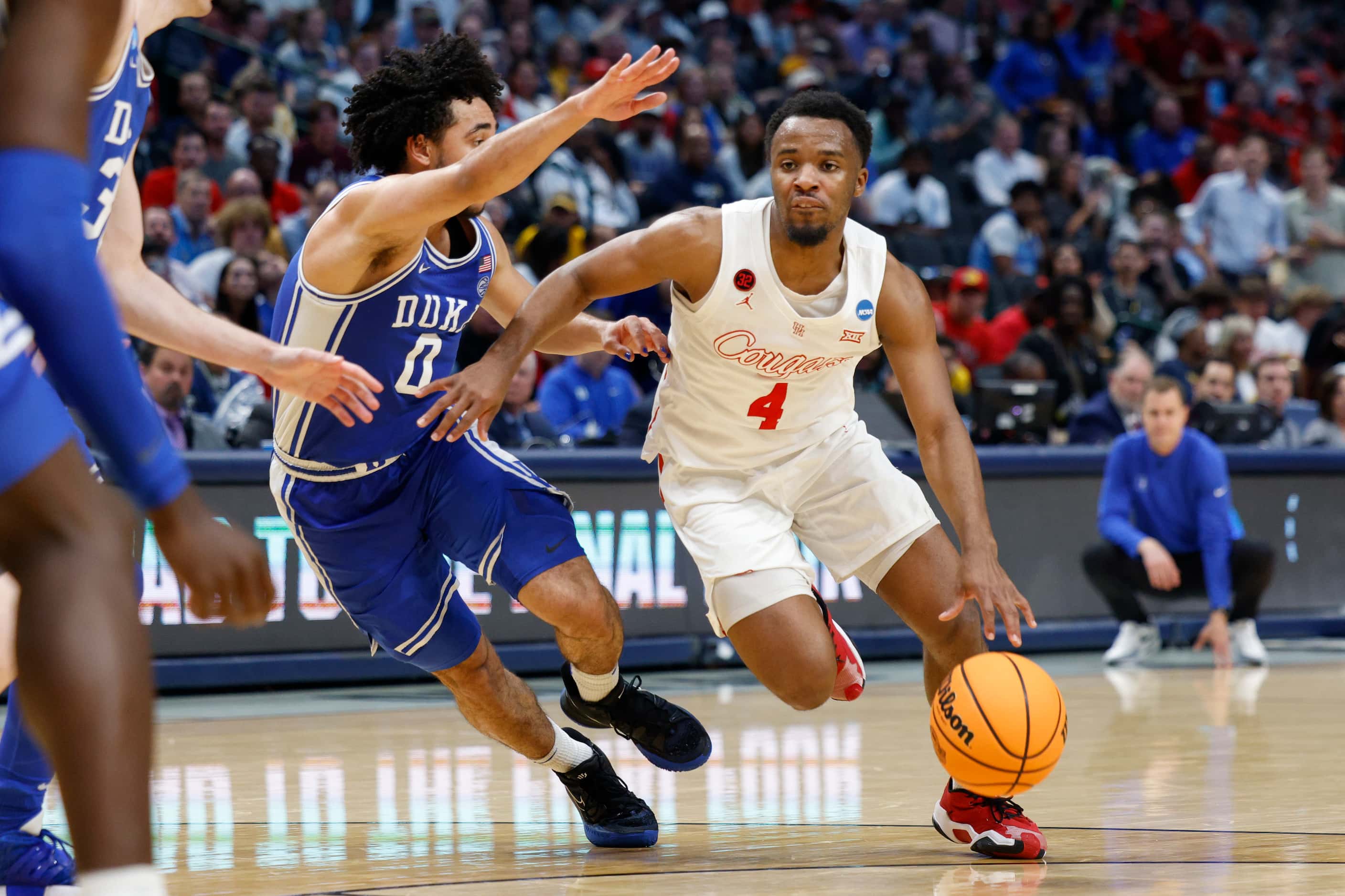 Duke guard Jared McCain (0) defends against Houston guard L.J. Cryer (4) during the second...