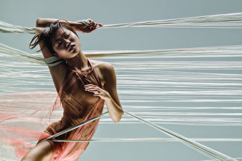Yujin Kim of Alonzo King LINES Ballet dances in King's Sand, set to a jazz score by Charles...