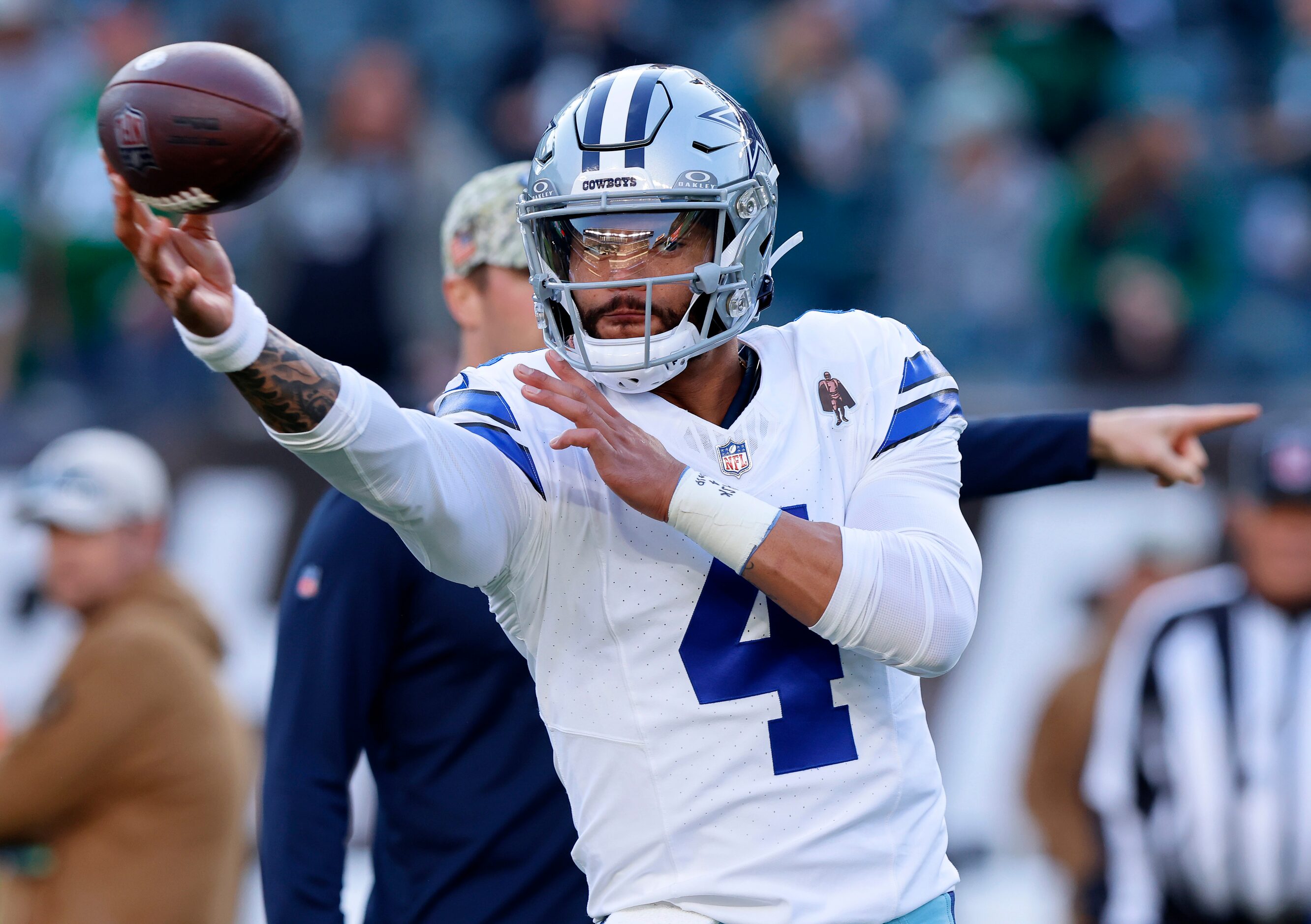 Dallas Cowboys quarterback Dak Prescott (4) warms up his arm before facing the Philadelphia...