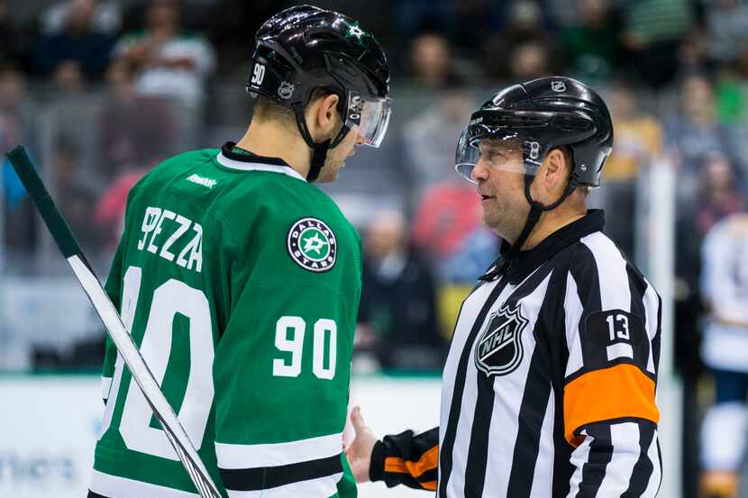 Dallas Stars center Jason Spezza (90) discusses an overturned goal with referee Dan...