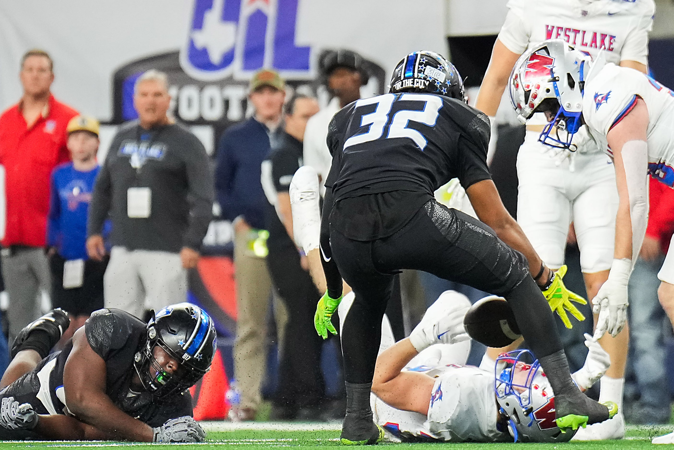 Austin Westlake Grady Bartlett (36) loses a fumble as North Crowley linebacker Avery Dotson...