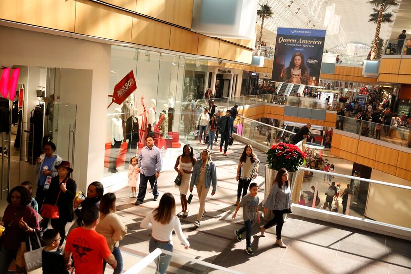 People shop at the Galleria in Dallas in Dallas on Nov. 23, 2018. 