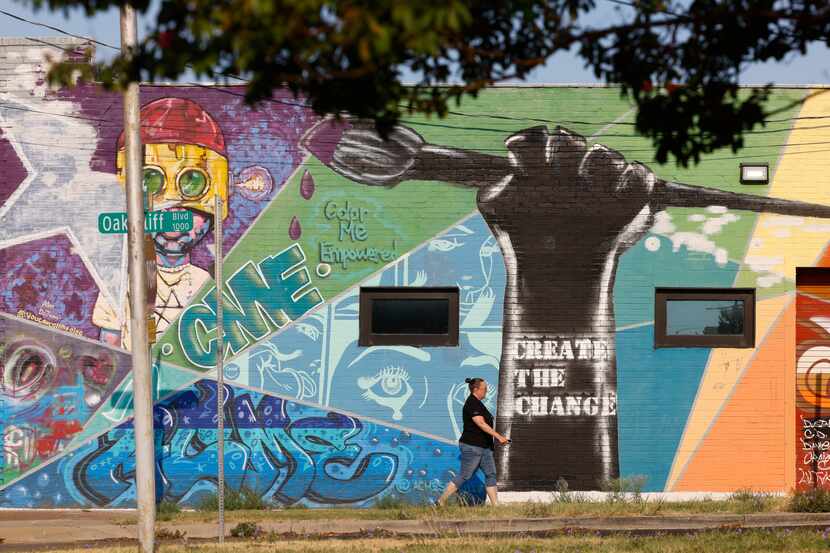 One of the murals painted on small-business operations along West Clarendon Drive, a central...