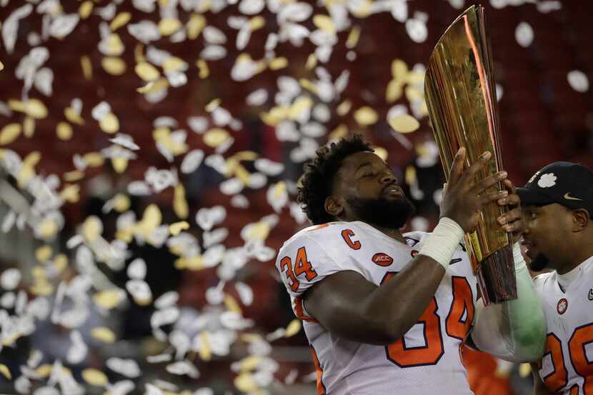 Clemson's Kendall Joseph celebrates after the NCAA college football playoff championship...