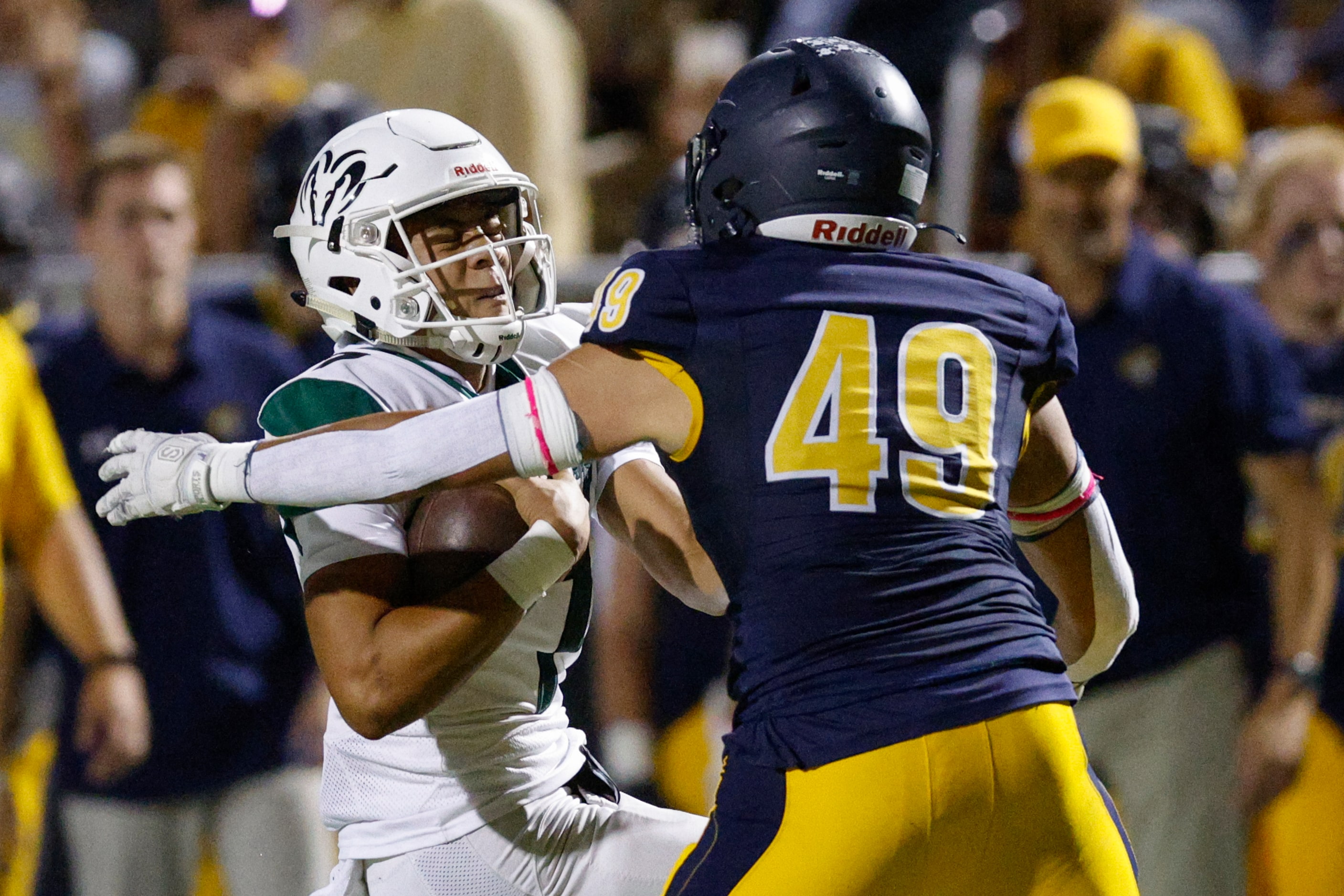 Highland Park linebacker Jack Morse (49) tackles Richardson Berkner quarterback Cornell...