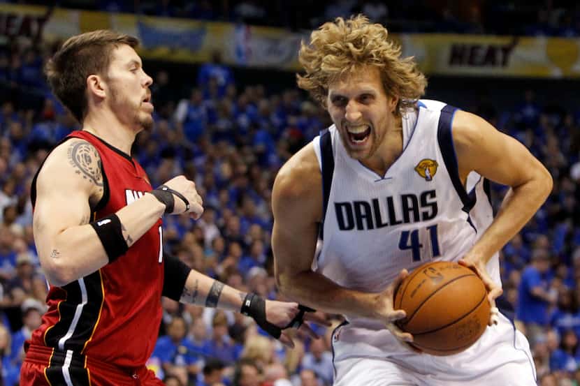 Miami Heat shooting guard Mike Miller (13) defends Dallas Mavericks power forward Dirk...