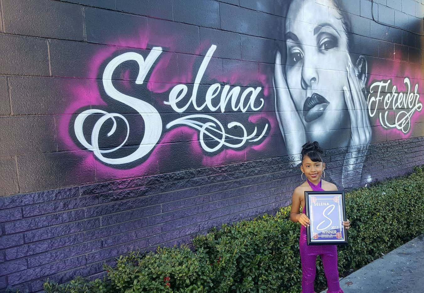Azlie Jolie Garcia from Dallas won the Selena look-a-like contest at Country Burger in Oak...