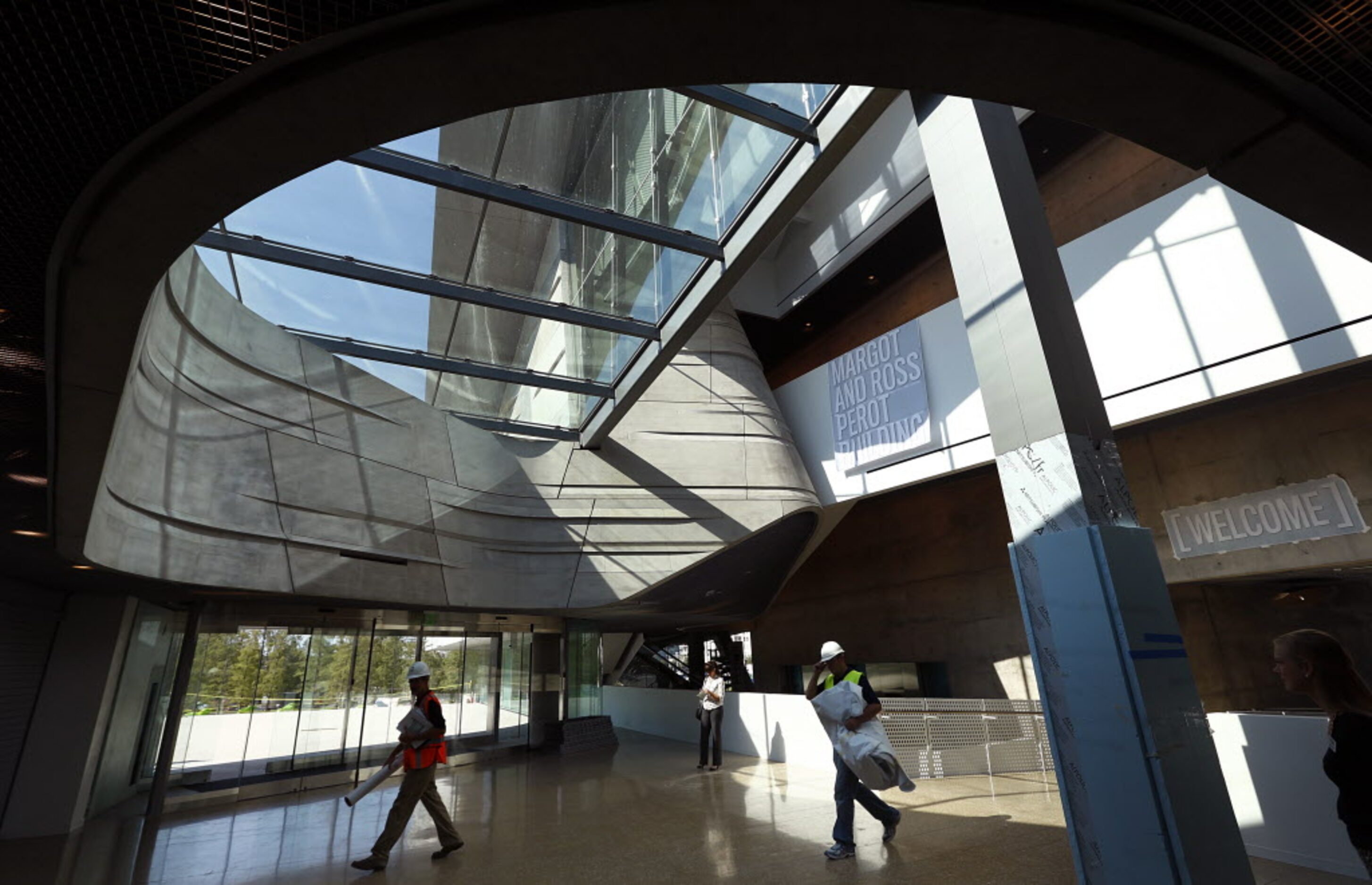 Sun shines through the front entry to the Perot Museum of Nature and Science in Dallas,...