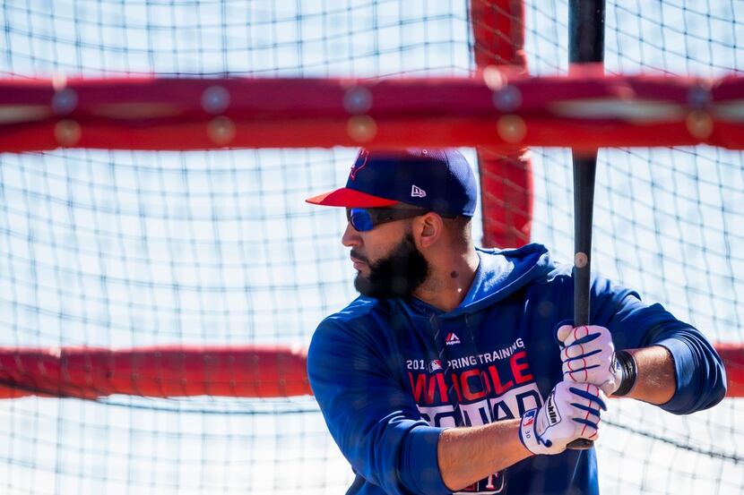 Texas Rangers outfielder Nomar Mazara takes batting practice during a spring training...