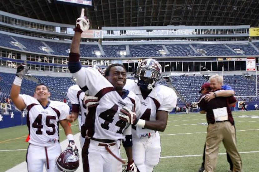 ORG XMIT: *S19211269* Rowlett defensive back Mica-el Mumba (44) celebrates with running back...