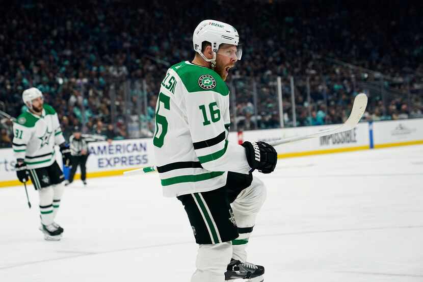 Dallas Stars center Joe Pavelski reacts after scoring against the Seattle Kraken during the...