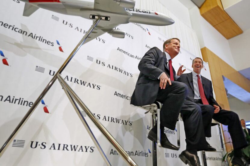US Airways' Doug Parker (left) and American Airlines' Tom Horton say they're satisfied with...