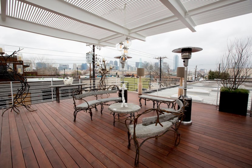 
Furnishings designed by Dallas sculptor George Sellers are displayed on the rooftop deck.
