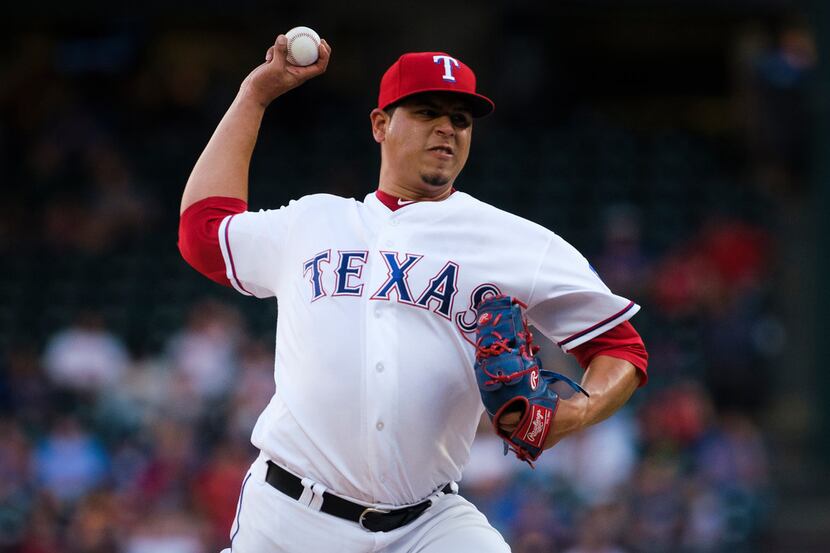 Texas Rangers relief pitcher Ariel Jurado delivers during the second inning against the...