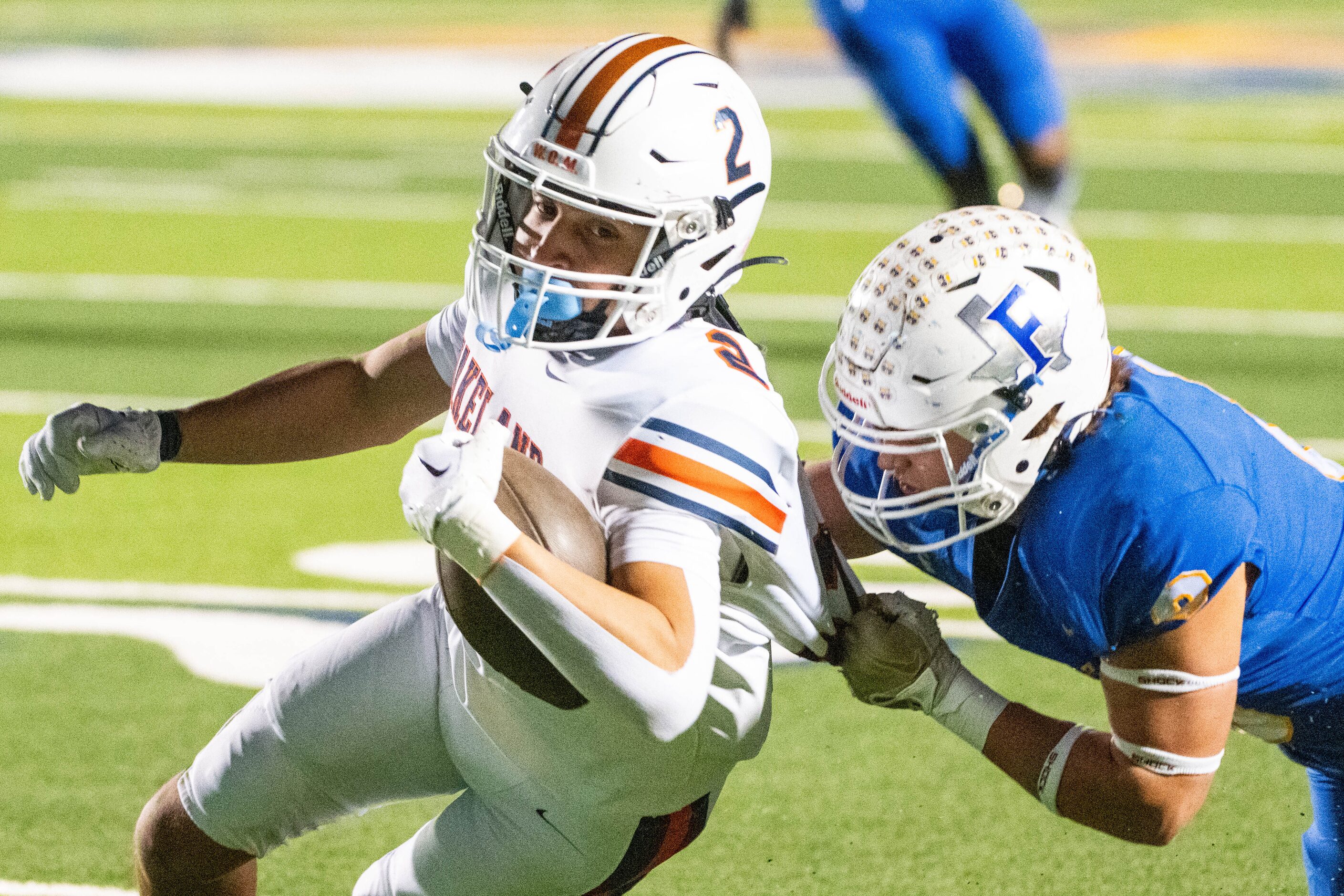 Wakeland's Ivan Molina (2) is tackled by Frisco's Mason Mitchell (0) in the first half...