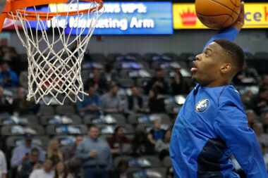 Dallas Mavericks guard Dennis Smith Jr. (1) dunks during warmups before the Houston Rockets...