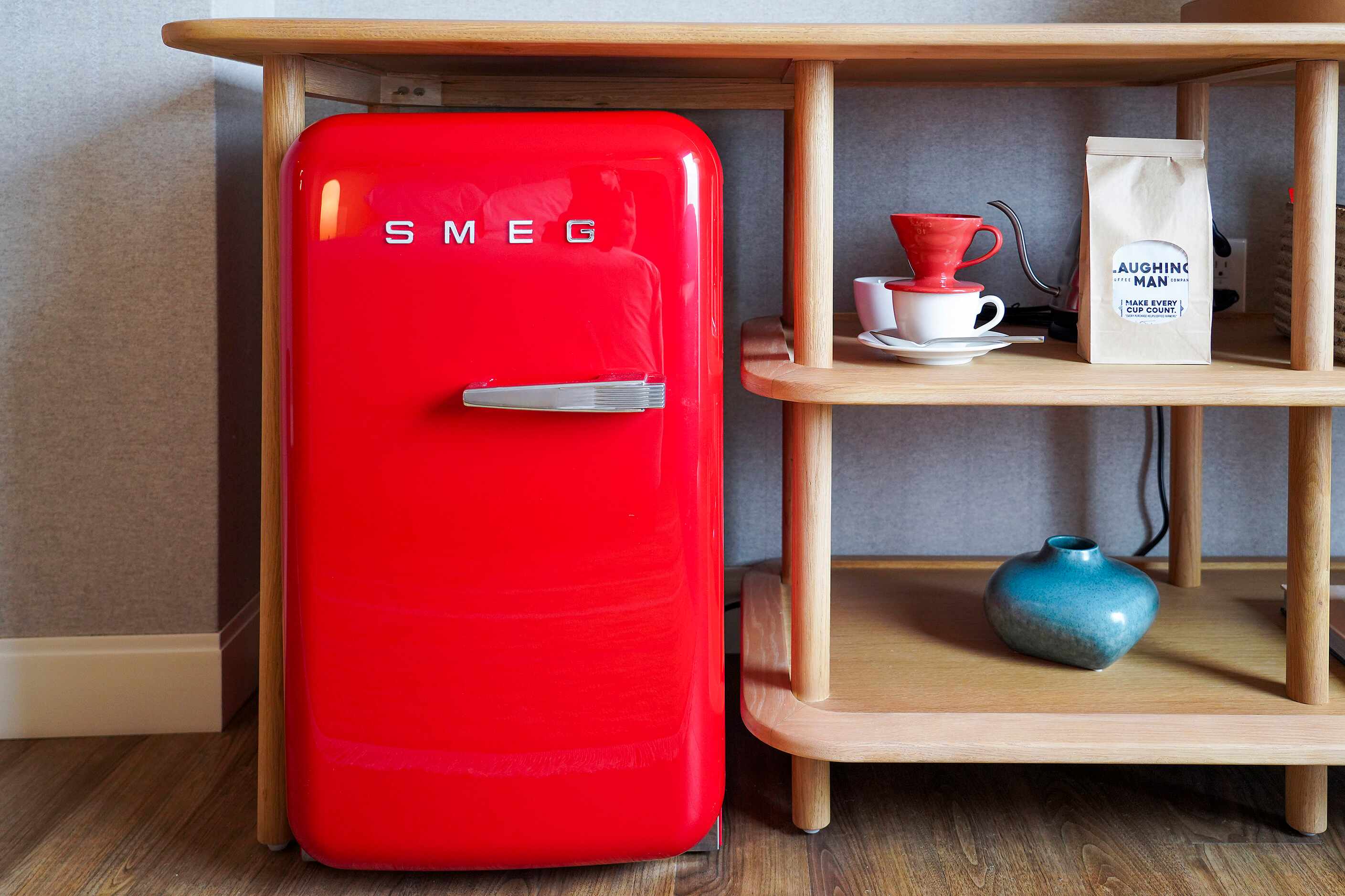 A SMEG mini-fridge and Laughing Man coffee service in a standard Chamber at new the Virgin...