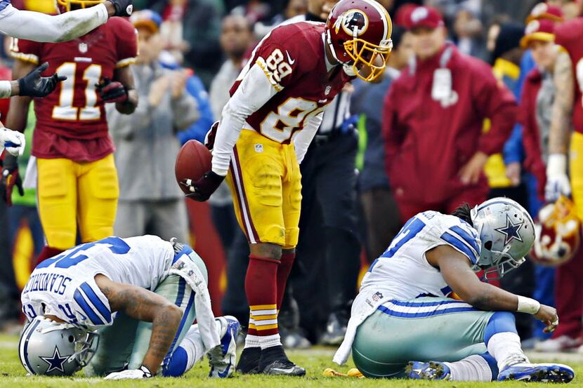 Washington Redskins wide receiver Santana Moss (89) taunts Dallas Cowboys strong safety J.J.