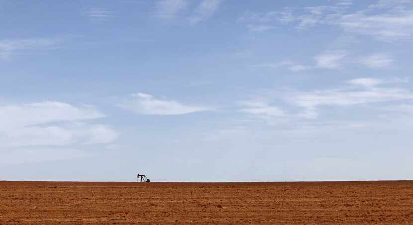 A pumpjack sits on the West Texas horizon. 