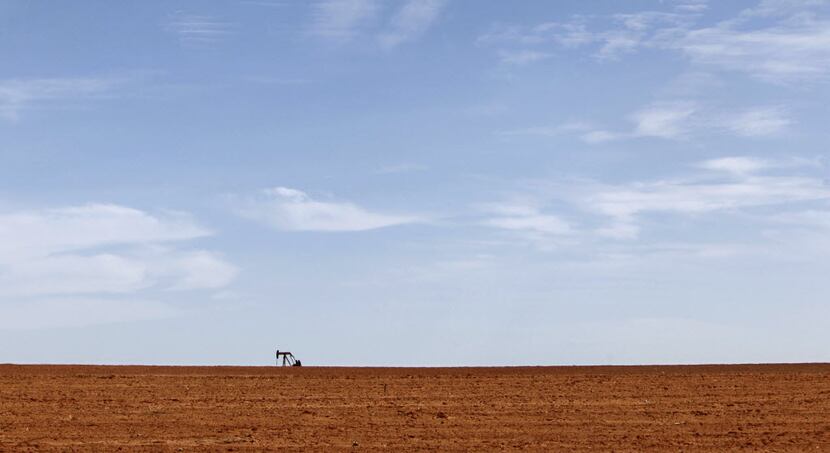 A pumpjack sits on the West Texas horizon. 