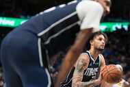 Dallas Mavericks center Dereck Lively II shoots a free throw during the second half in Game...