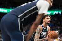 Dallas Mavericks center Dereck Lively II shoots a free throw during the second half in Game...