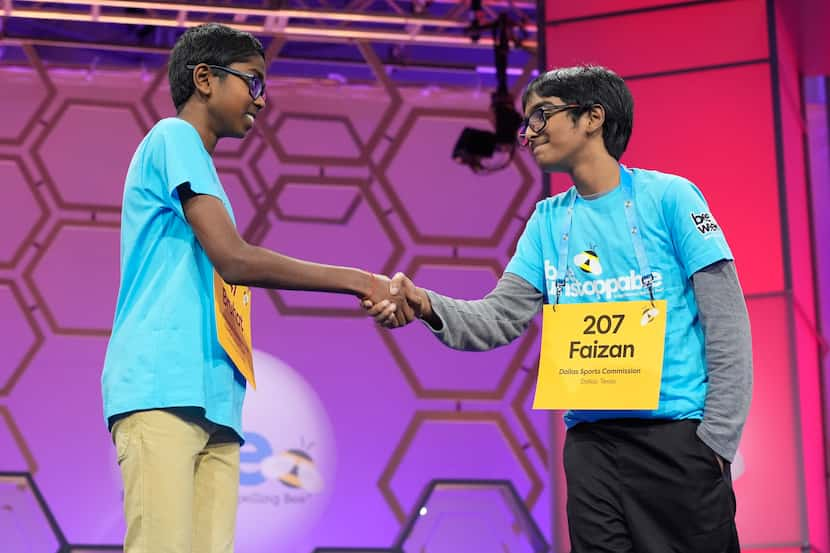 Bruhat Soma (left) of Tampa, Fla., shakes hands Thursday with Faizan Zaki of Allen after the...