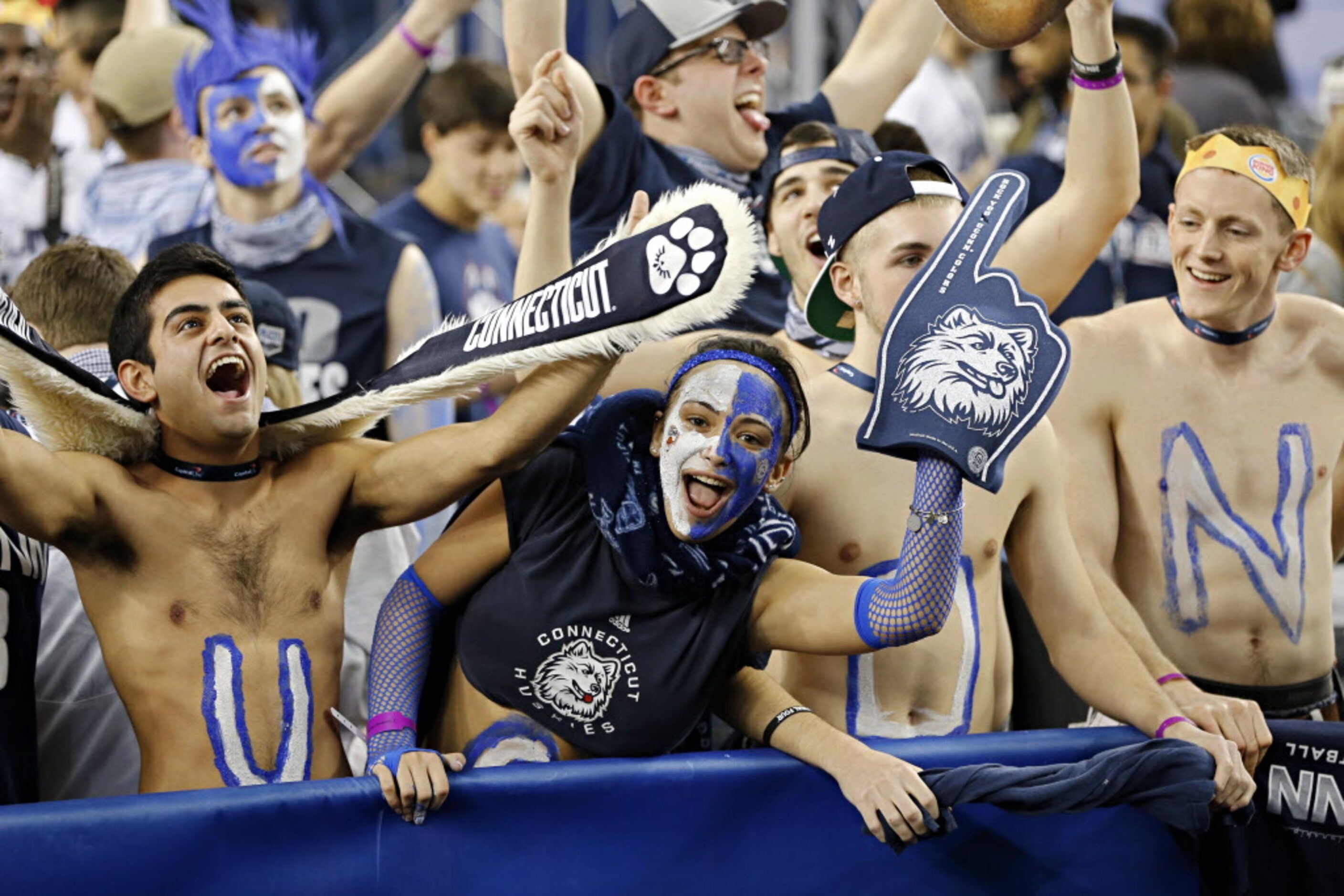 Connecticut Huskies fans prepare for the game against the Florida Gators during the NCAA...